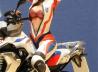 Sitzende Motorradfahrerin - Race Girl