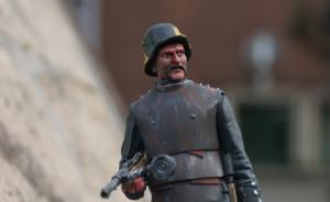 Deutscher Sturmmann mit Grabenpanzer